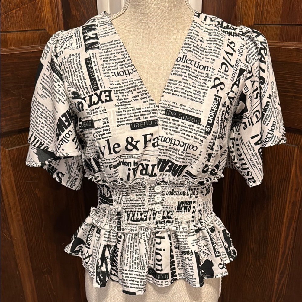 Live 4 Truth Black and White Newpaper Print Short Sleeve Blouse